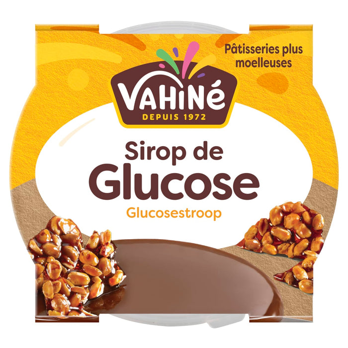 Un produit Vahiné Sirop de Glucose, faisant partie de Sgk Uploads, affiché sur son étiquette avec un sirop brun riche et du nougat aux cacahuètes, promouvant 'Pâtisseries plus moelleuses' pour des pâtisseries plus moelleuses.