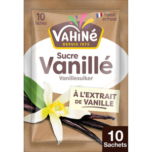 Un sachet de sucre vanillé de la marque Vahiné, avec des gousses de vanille et une fleur.