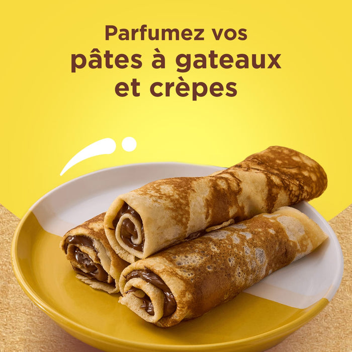 Une assiette de crAapes roulACes garnies d'une pActe A? tartiner au chocolat, suggACrant une faA?on de parfumer les pActes A? gActeaux et A? crAapes.