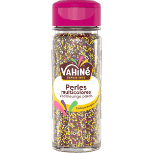 Un récipient de perles multicolores de la marque Vahiné.