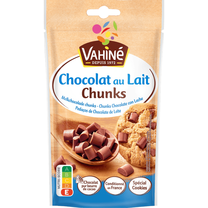 Un paquet de Vahiné Chocolat au Lait Chunks, un produit de la marque McCormick, utilisé pour la pâtisserie et les desserts.
