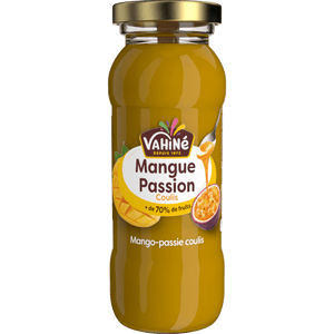Une bouteille de jus Vitamont Mangue Passion, mettant en valeur la marque et les saveurs de fruits.