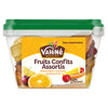Un contenant en plastique transparent de Vahine Fruits Confits Assortis est présenté avec une suggestion de présentation d'agrumes confits et de cerises sur l'étiquette.