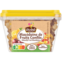 Un récipient de Valais Macédoine de Fruits Confits, ou salade de fruits confits, est présenté avec son emballage et ses informations nutritionnelles.