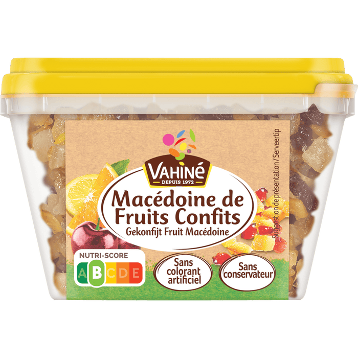 Un récipient de Valais Macédoine de Fruits Confits, ou salade de fruits confits, est présenté avec son emballage et ses informations nutritionnelles.