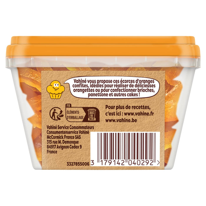 Un contenant en plastique transparent d'écorces d'oranges confites Vahine, montré de dos pour afficher les informations sur le produit et le code-barres.