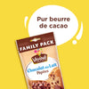 Un paquet familial de pépites de chocolat au lait Valrhona avec une bulle de dialogue mettant en évidence le pur beurre de cacao.