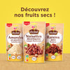 Publicité de la marque Vahiné présentant sa sélection de fruits secs, notamment des amandes, des noisettes et des raisins.