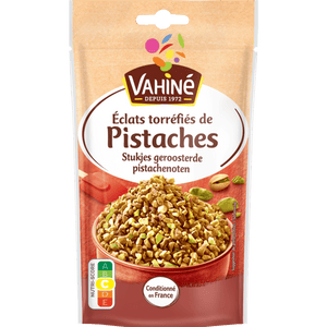 Un paquet de pistaches hachées de la marque Vahiné, idéal pour la pâtisserie et la décoration de desserts.