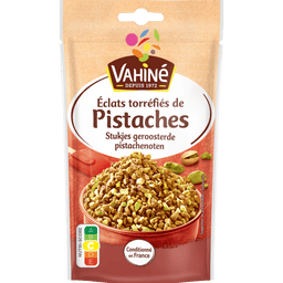 Un paquet de pistaches hachées de la marque Vahiné, idéal pour la pâtisserie et la décoration de desserts.