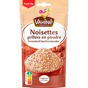 Un paquet de noisettes grillées en poudre de la marque Vahiné est présenté.