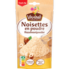 Un paquet de poudre de noisettes Vahiné est présenté, soulignant son utilisation en pâtisserie et en cuisine.