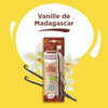 Un paquet de gousses de vanille de Madagascar Alnatura est prACsentAC avec des gousses et des fleurs de vanille sur un fond jaune.