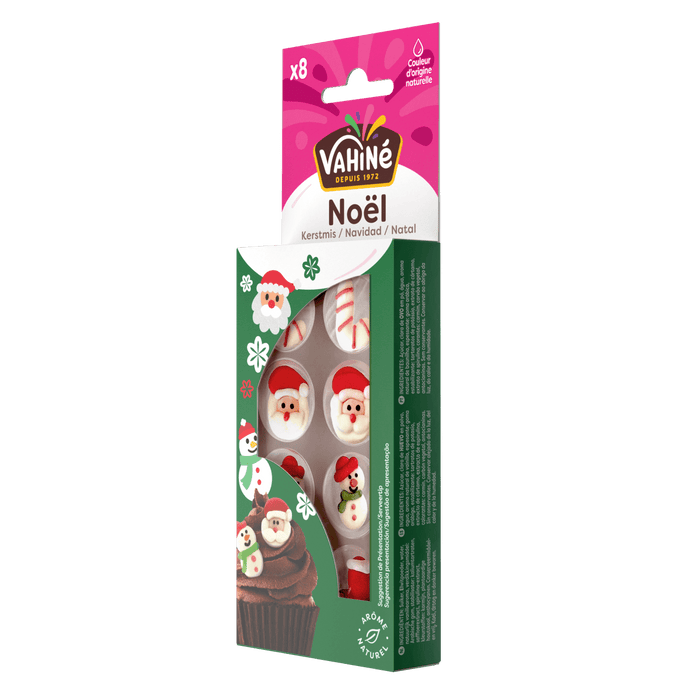 Une boARte de friandises au chocolat Vitamine NoA<l dACcorACes de motifs festifs de PA?re NoA<l et de bonhommes de neige.