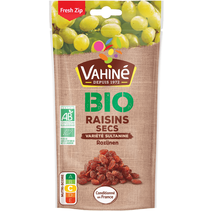 Un paquet de Raisins Secs Bio Vahiné, avec une image de raisins frais et secs.
