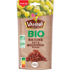 Un paquet de Raisins Secs Bio Vahiné, avec une image de raisins frais et secs.