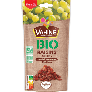 Un paquet de Raisins Secs Bio Vahiné, avec une image de raisins frais et secs.