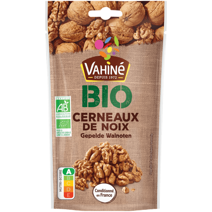 Un sac de cerneaux de noix Vahiné BIO est présenté, mettant en valeur la nature biologique du produit.