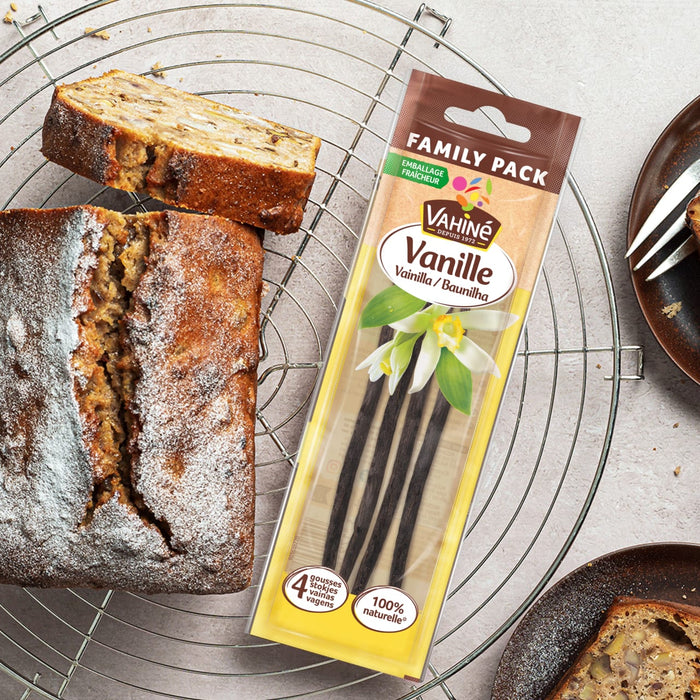 Un pain aux bananes est prACsentAC A? cA?tAC d'un paquet de gousses de vanille LittlePod Vanilla Vanilla Quality.