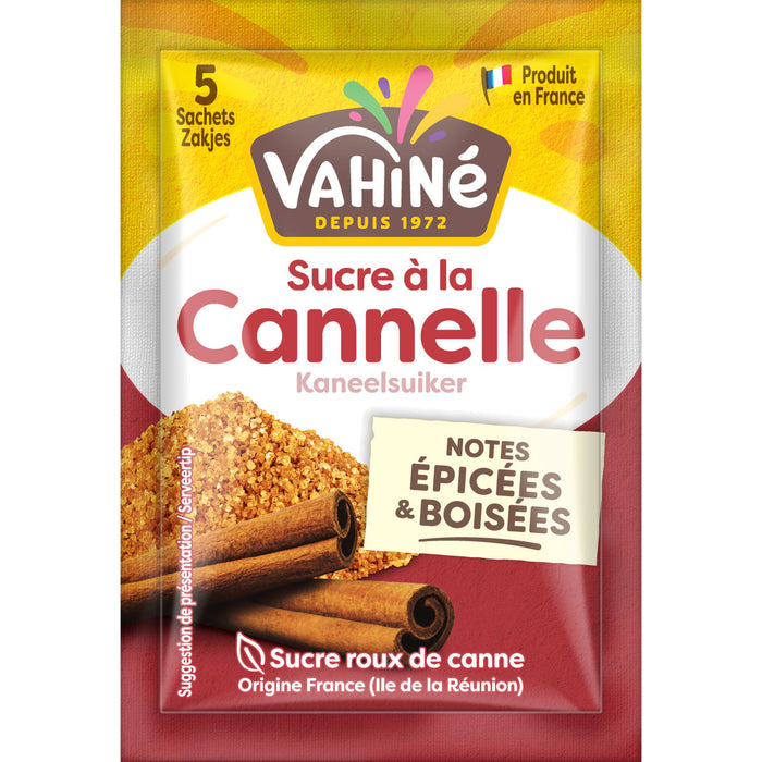 Un paquet de sucre A? la cannelle VahinAC, un produit fabriquAC en France, prACsentant des bActons de cannelle et des granules de sucre.