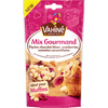 Un paquet de Vahiné Mix Gourmand pour la pâtisserie contenant des pépites de chocolat blanc, des cranberries et des morceaux de caramel au beurre salé, idéal pour faire des muffins.