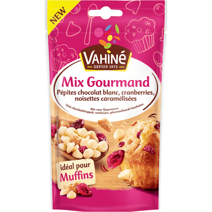 Un paquet de Vahiné Mix Gourmand pour la pâtisserie contenant des pépites de chocolat blanc, des cranberries et des morceaux de caramel au beurre salé, idéal pour faire des muffins.
