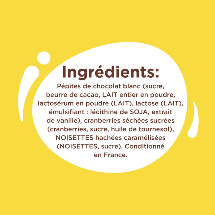 Liste des ingrédients d'un produit au chocolat blanc, comprenant beurre de cacao, lait en poudre, lactose, extrait de vanille, cranberries, huile de tournesol et noisettes.
