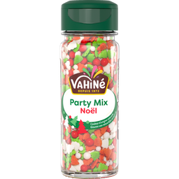 Un récipient de décorations Vahiné Party Mix Noël, avec des formes festives rouges, vertes et blanches.