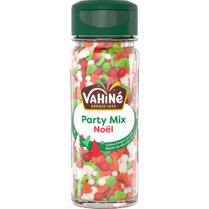 Un récipient de décorations Vahiné Party Mix Noël, avec des formes festives rouges, vertes et blanches.