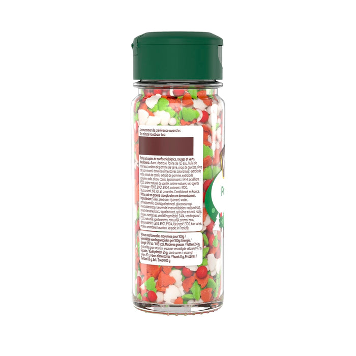 Une bouteille de dACcorations de NoA<l avec un couvercle vert et une ACtiquette contenant des informations nutritionnelles.
