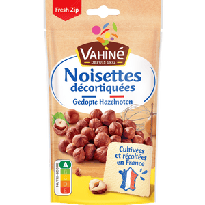 Un paquet de noisettes décortiquées Vahiné, soulignant qu'elles sont cultivées en France.