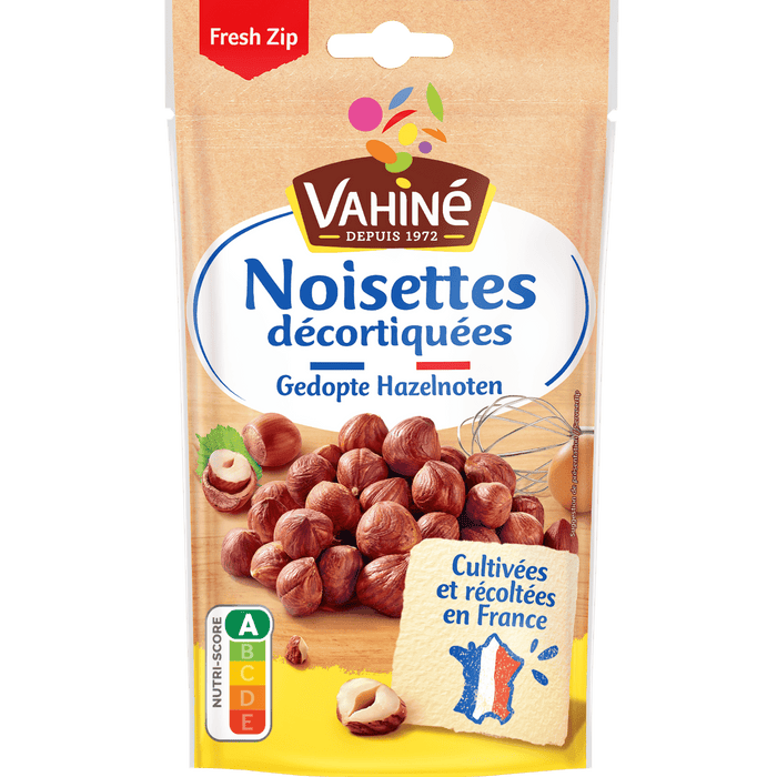 Un paquet de noisettes décortiquées Vahiné, soulignant qu'elles sont cultivées en France.