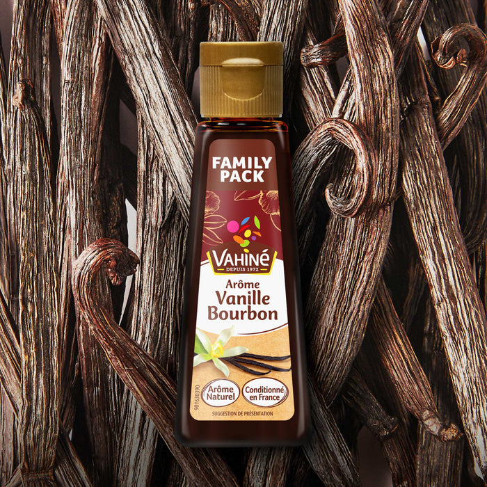 Une bouteille d'extrait de vanille Bourbon Wiberg Family Pack est prACsentACe sur un fond de gousses de vanille.