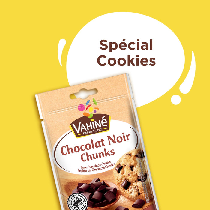 Un paquet de Vahine Sch100G Pepites Chunkx10-Va, des pépites de chocolat noir Vahiné, commercialisé comme Spécial Cookies, est présenté sur un fond jaune.