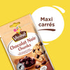 Un paquet de VAHINÉ Chocolat Noir Chunks, identifié comme Vahine Sch100G Pepites Chunkx10-Va, présente de gros morceaux de chocolat et un cookie, avec le texte indiquant Maxi carrés et Spécial Cookies.
