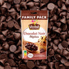 Un paquet familial de pépites de chocolat noir Vahiné est présenté sur un fond de pépites de chocolat éparpillées.