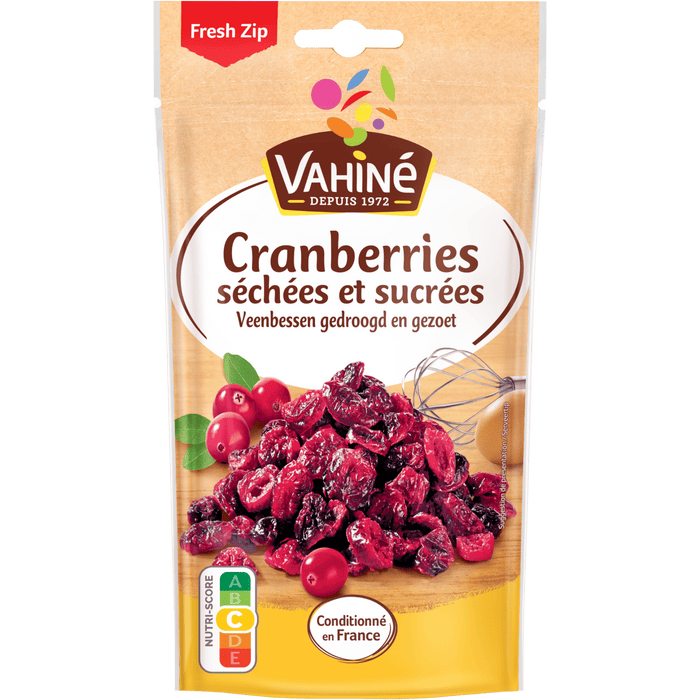 Un paquet de canneberges séchées et sucrées de la marque Vahiné est présenté.