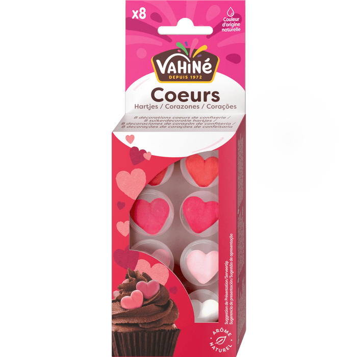 Un paquet de décorations en forme de cœur Vahiné Coeurs pour la pâtisserie, avec un cupcake décoré de cœurs.
